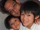 Vincent Young enjoys a moment with his two young sons.