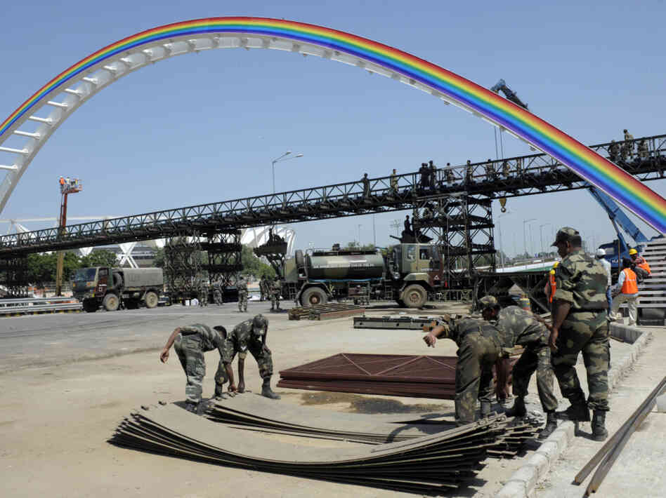Indian soldiers rebuild a bridge Indian soldiers rebuild a bridge