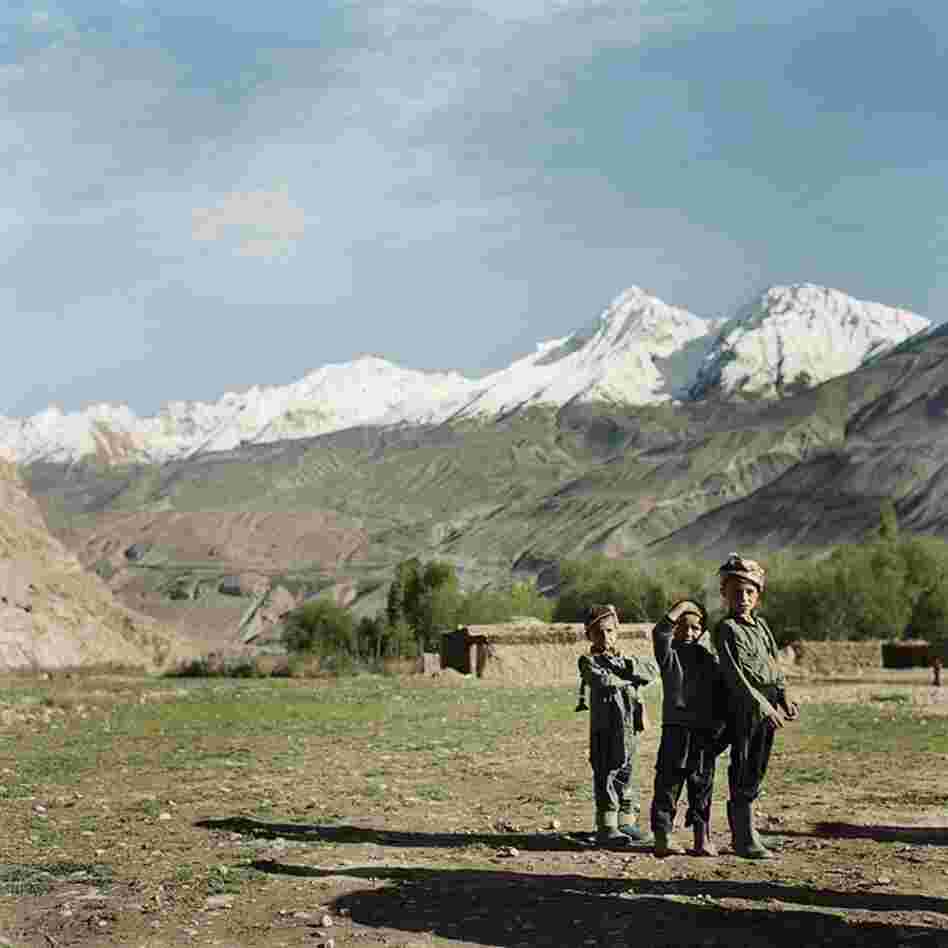 Boys take a break from playing in the village of Ghaz Khan.  Schooling is accessible in most villages, making this new generation the first to benefit from widespread education.