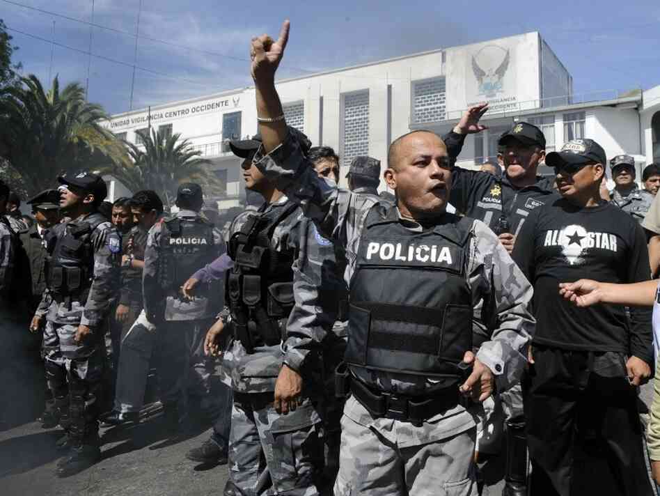 Rebellious police personnel shout slogan Rebellious police personnel shout slogan