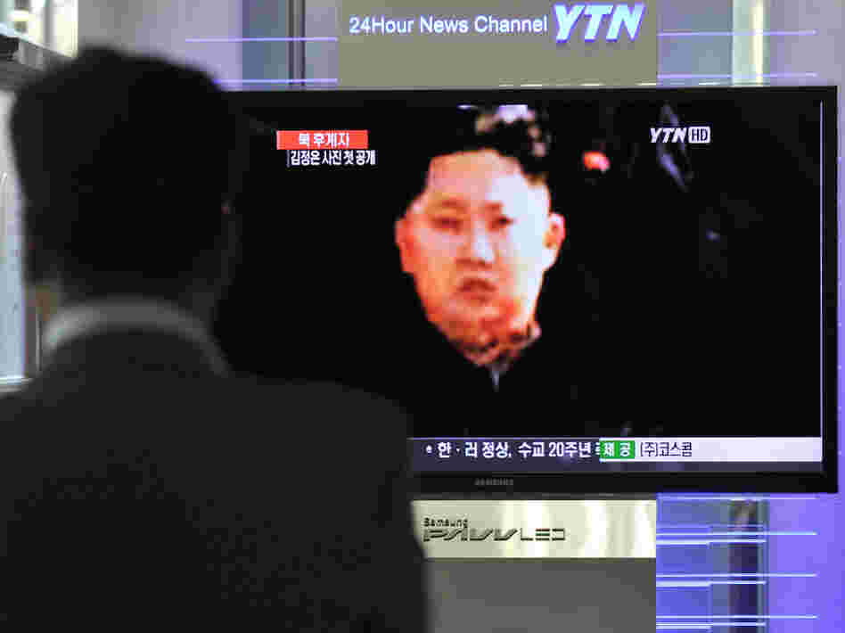 (FILES) South Korean man watches a TV sc (FILES) South Korean man watches a TV sc