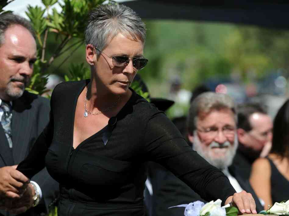 Actress Jamie Lee Curtis places a flower Actress Jamie Lee Curtis places a flower