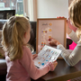 A teacher and a girl with autism. A teacher and a girl with autism.