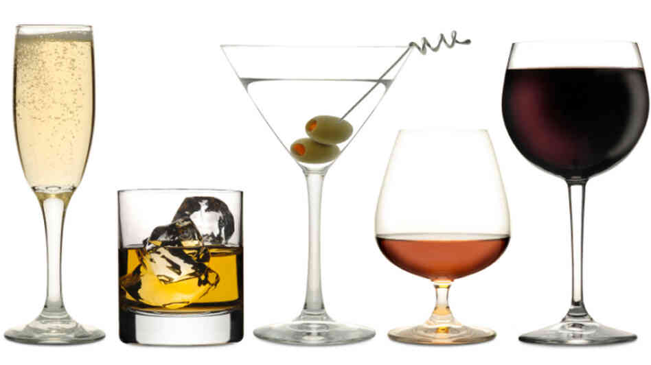 A lineup of alcoholic drinks. A lineup of alcoholic drinks.