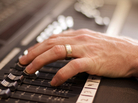 Hand on fader Hand on fader