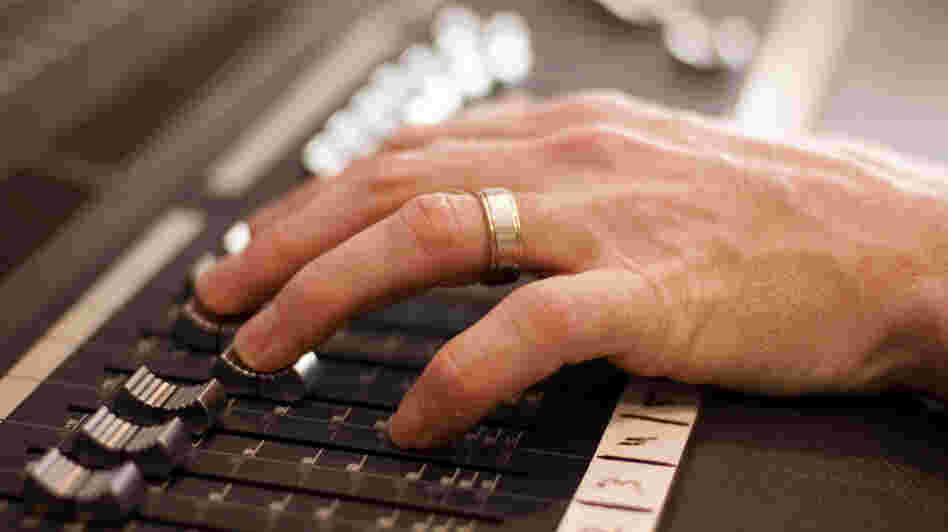 Hand on fader Hand on fader