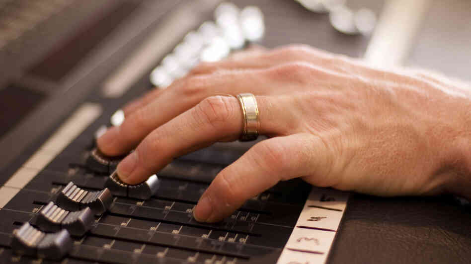 Hand on fader Hand on fader