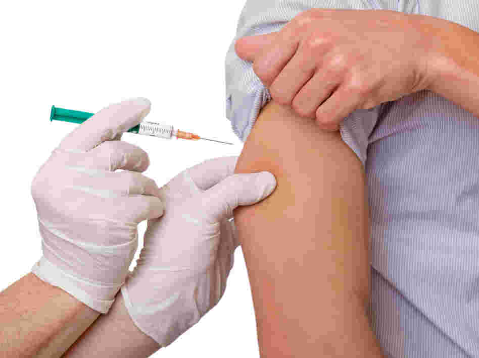 Man gets a flu shot Man gets a flu shot