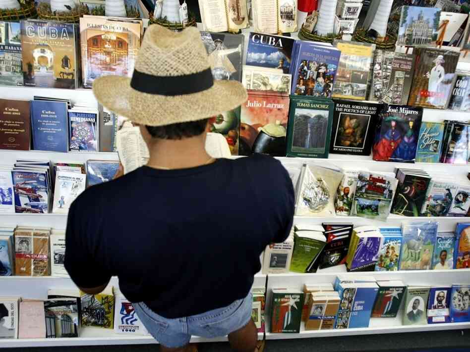 Rows of Spanish titles line the shelves at a store in Miami Rows of Spanish titles line the shelves at a store in Miami