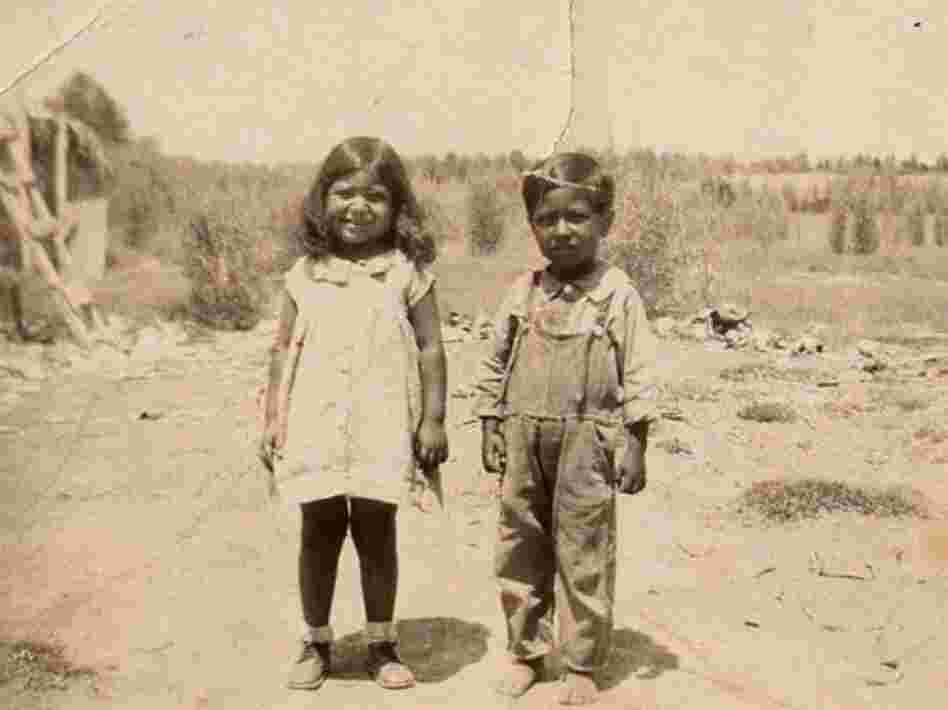 Cesar Chavez, six years old, with his sister. Chavez was born on a small Arizona farm and became an itinerant laborer when his family lost their ranch. Before Chavez and the labor movement, migrant workers had practically no rights. 