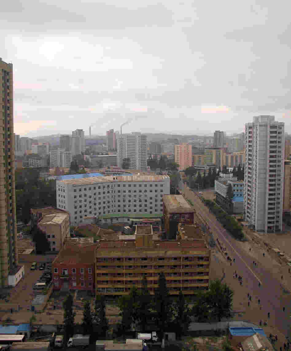 During the early morning in North Korea's capital, Pyongyang, the roads are virtually empty of traffic as people walk to work. 