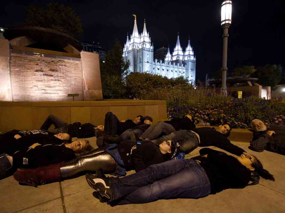 Gay-rights activists protest near the Church of Jesus Christ of Latter-day Saints temple in Salt Lake City. Gay-rights activists protest near the Church of Jesus Christ of Latter-day Saints temple in Salt Lake City.