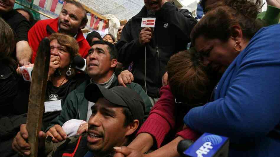 Relatives of miner Carlos Barrios react Relatives of miner Carlos Barrios react