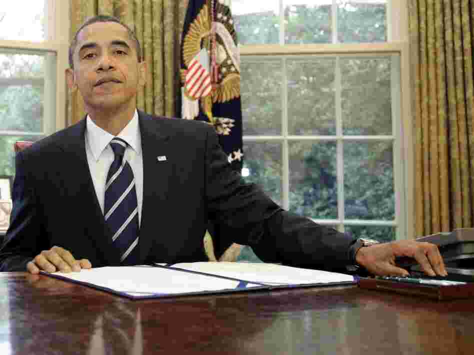Obama at Oval Office desk Obama at Oval Office desk