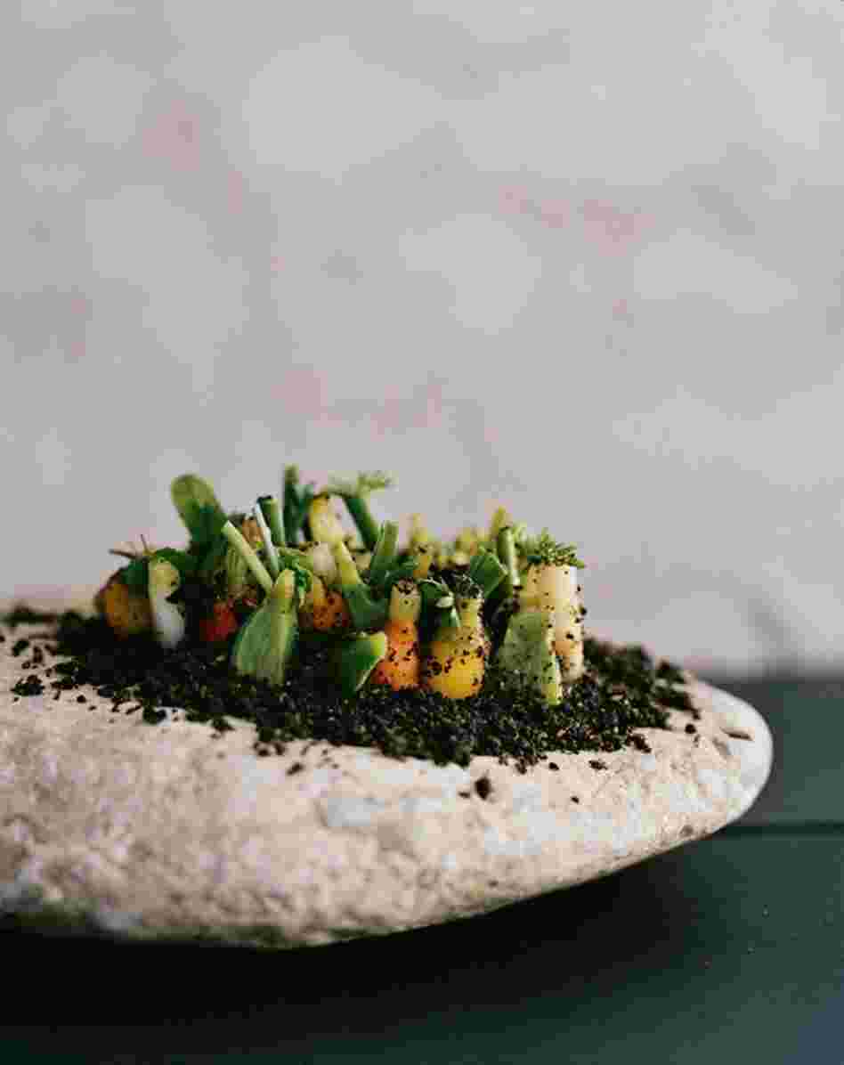 Vegetable Field: The "soil" in this dish is made of malt, hazelnut and regular flour, sugar, lager, salt and butter — and takes two days to create.
