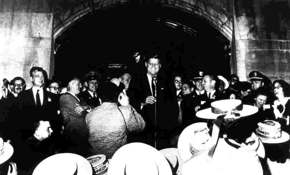 Sen. John F. Kennedy proposes the Peace Corps during a presidential campaign speech on the steps of the Michigan Union at the University of Michigan, 1960