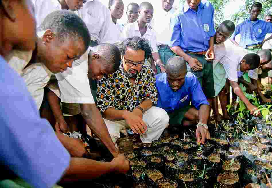Planting trees with a local school in Ghana, 2000
