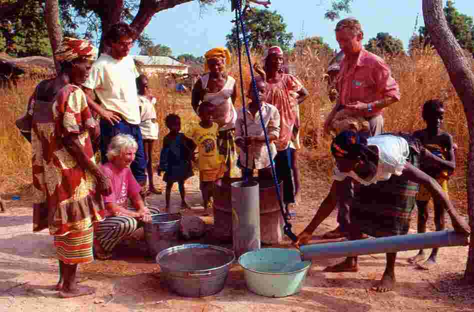 Working in Mali to construct water pumps for rural villages, 1989