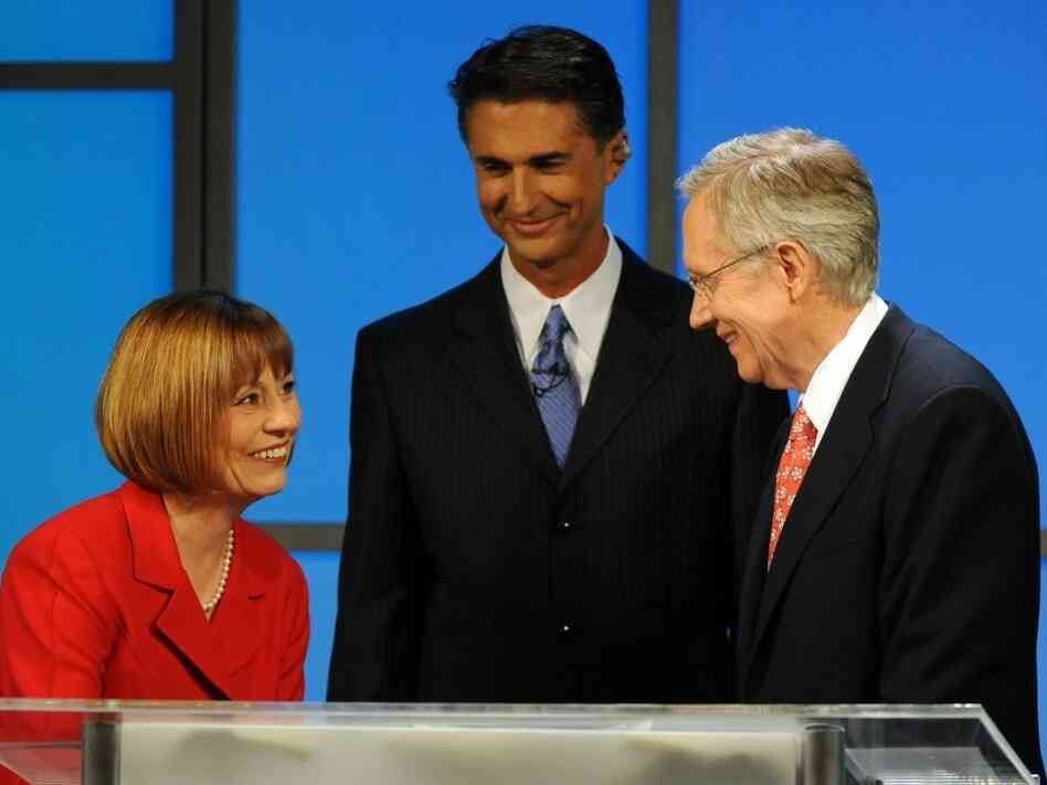 Nevada Sen. Harry Reid (right) talks to his opponent, Republican Sharron Angle. Nevada Sen. Harry Reid (right) talks to his opponent, Republican Sharron Angle.