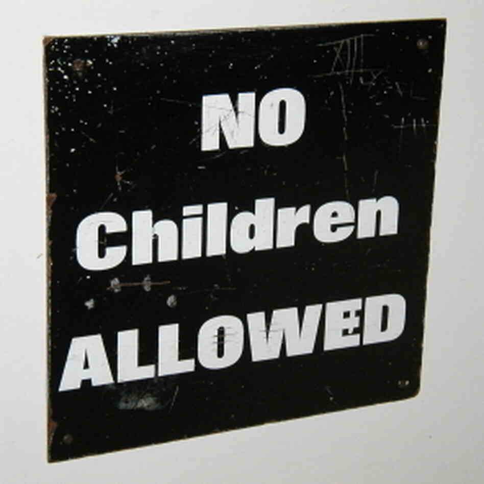A sign reads "NO Children ALLOWED." A sign reads "NO Children ALLOWED."