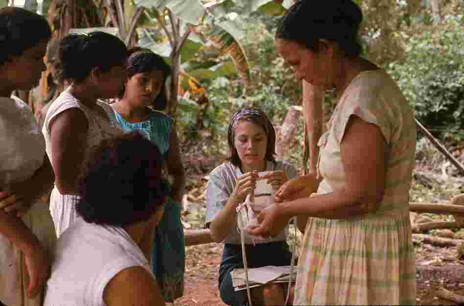 Working with a women's group to create crafts as a source of secondary income in Panama, 1969