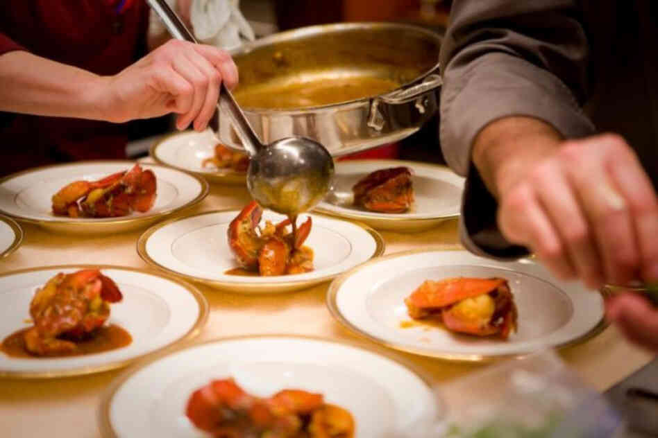 The recipe for Lobster a l'Americaine begins with brewing a homemade fish stock from 5 pounds of white fish bones.