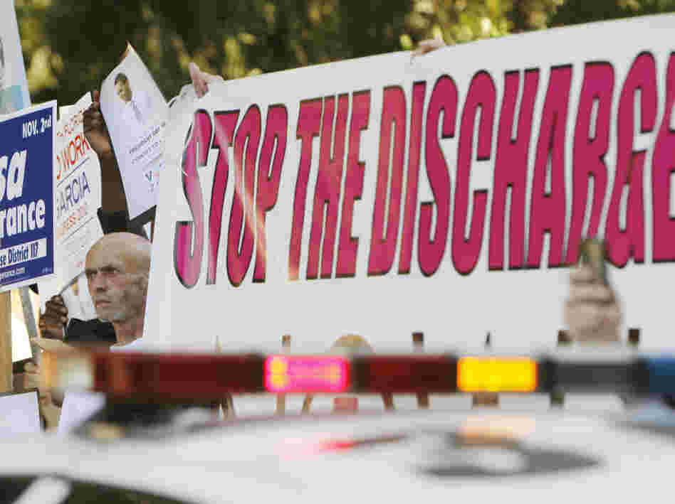 Larry Whitt protests the "don't ask, don't tell" policy as the president arrives in Florida. Larry Whitt protests the "don't ask, don't tell" policy as the president arrives in Florida.