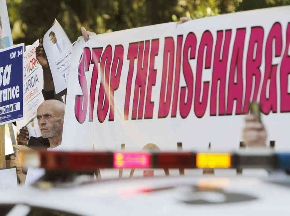 Larry Whitt protests the "don't ask, don't tell" policy as the president arrives in Florida. Larry Whitt protests the "don't ask, don't tell" policy as the president arrives in Florida.