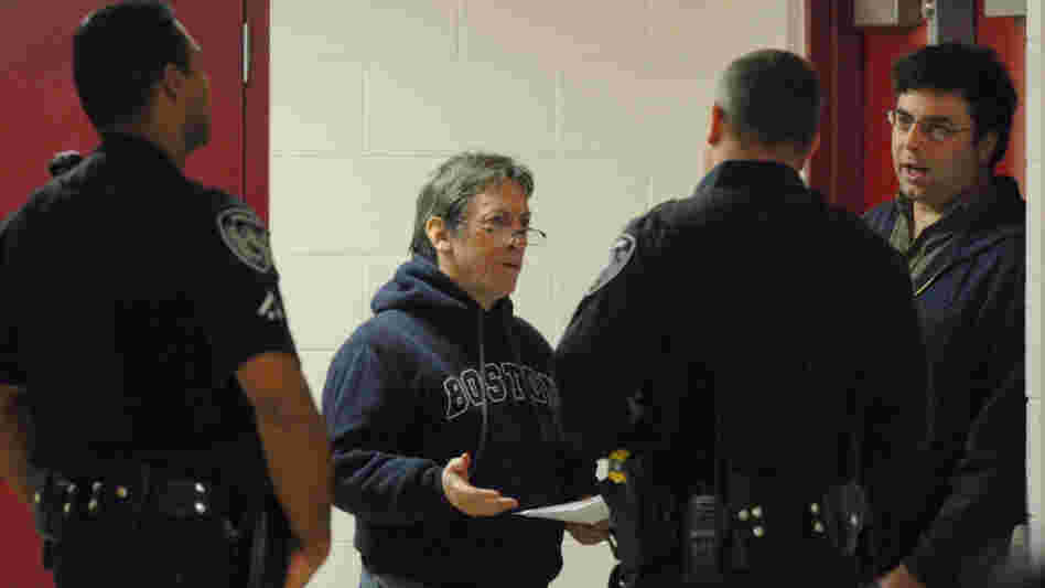 Reporter handcuffed Reporter handcuffed