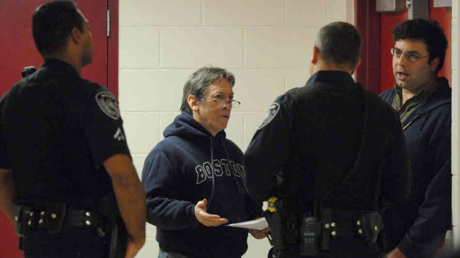 Reporter handcuffed Reporter handcuffed