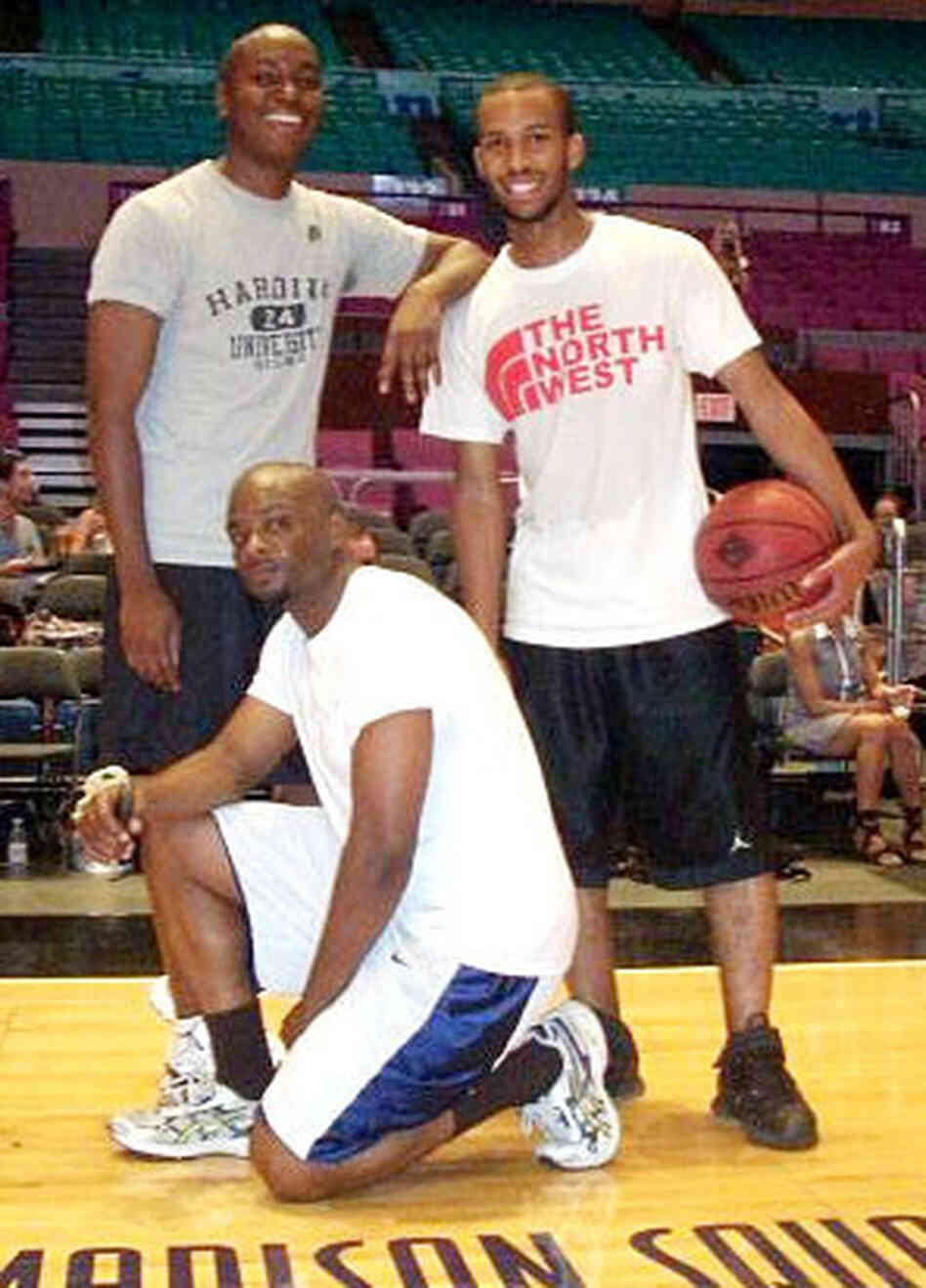 Writer Darren Sands poses with friends after a game of basketball. Writer Darren Sands poses with friends after a game of basketball.