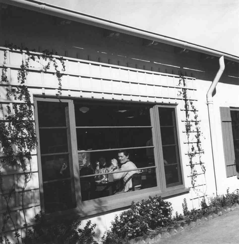 Women who work at the Santa Monica Douglas Company plant eat lunch at the Cape Cod Cottage.