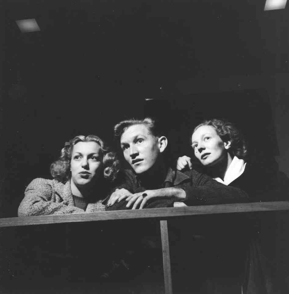 Cole Weston, his wife, Dorothy (right), and their friend watch a bowling tournament at Burbank Bowl.