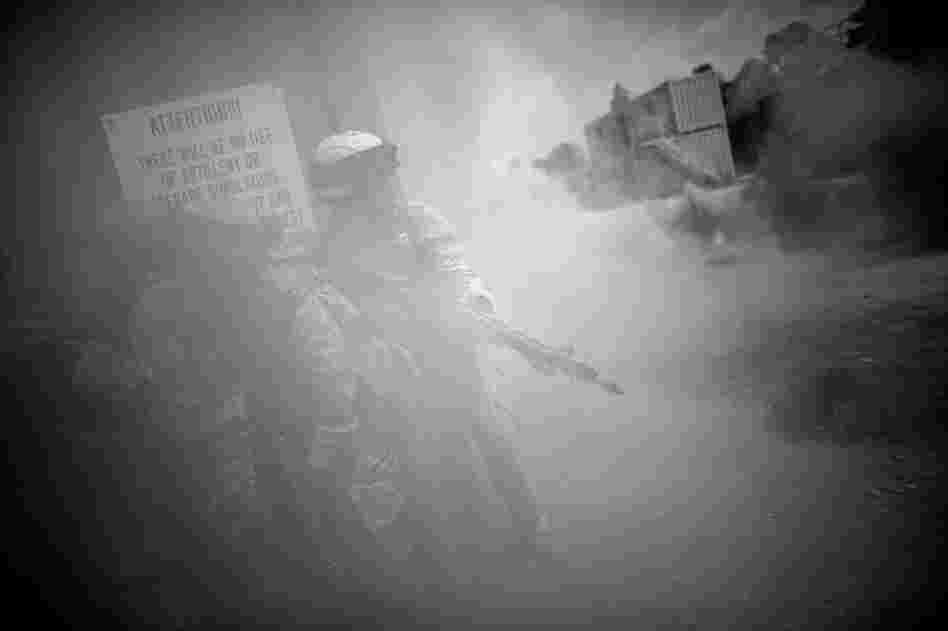 Soldiers yell for help after enemy fighters shot at their patrol during a mock combat exercise.