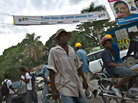 A banner in Port-au-Prince urges people to wash with soap A banner in Port-au-Prince urges people to wash with soap