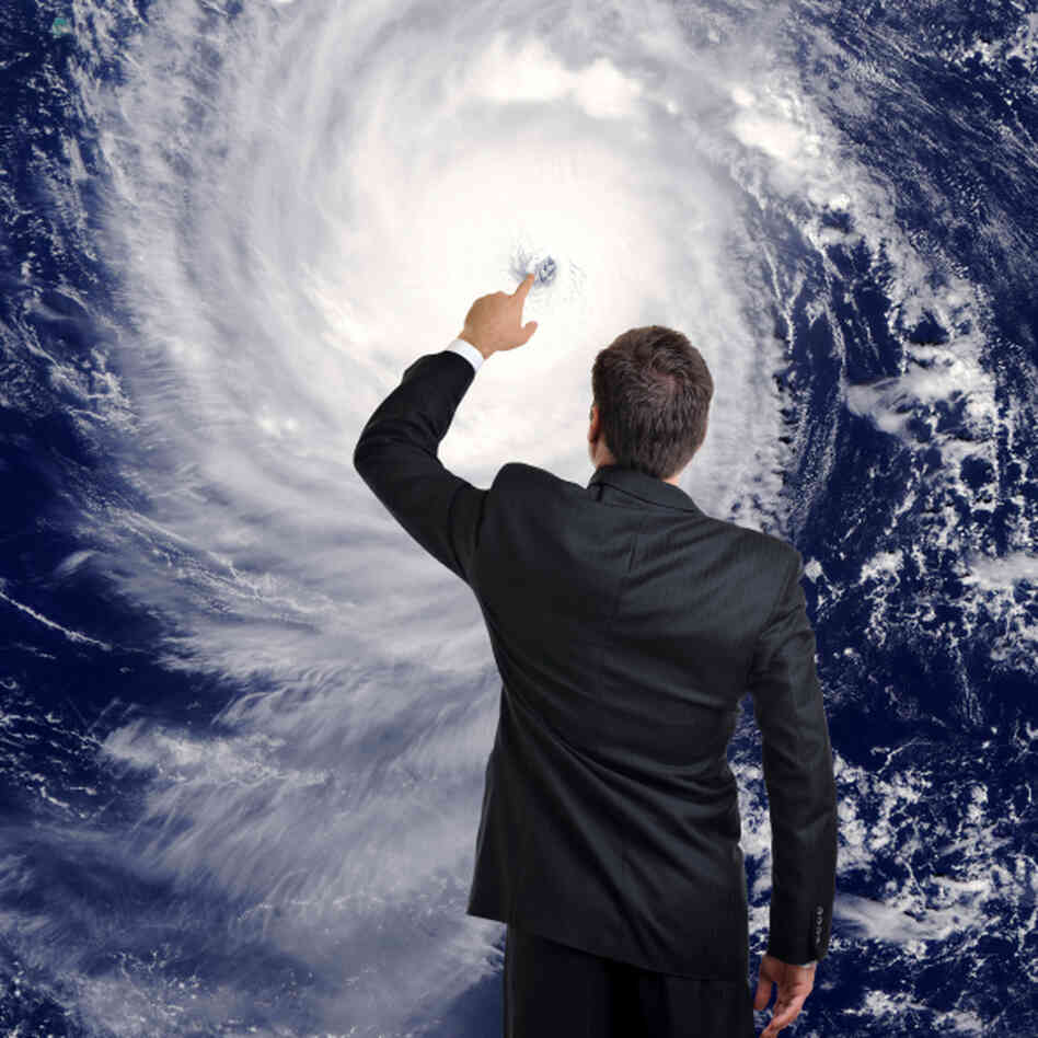 weatherman touching photo of hurricane weatherman touching photo of hurricane