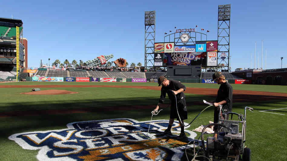 Groundskeepers at AT&T Park in San Francisco paint the World Series logo onto the field. Groundskeepers at AT&T Park in San Francisco paint the World Series logo onto the field.