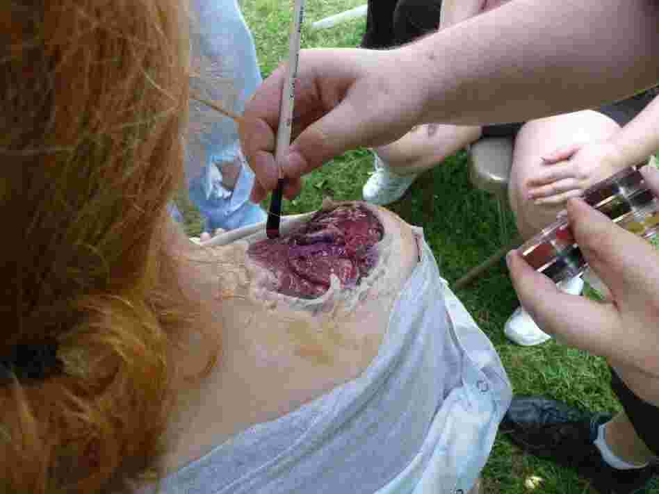 Beth Accomando's shoulder is made up with a wound Beth Accomando's shoulder is made up with a wound