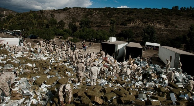 Members of the Mexican Army arrange 134 tons of marijuana