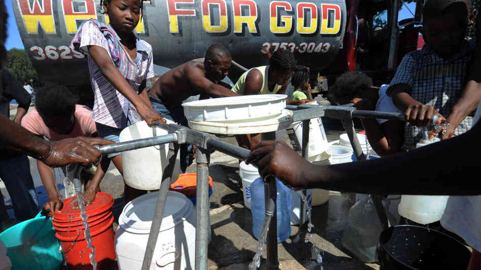 People distribute potable water People distribute potable water