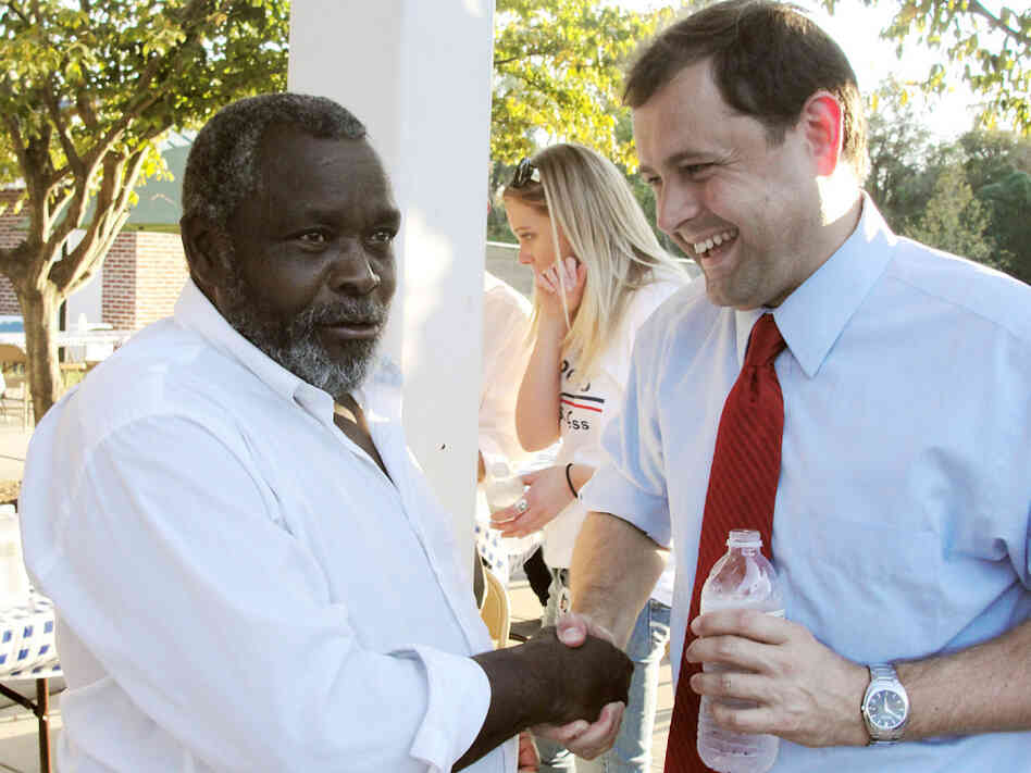 Rep. Tom Perriello (D-VA) (right) speaks to a potential voter. Rep. Tom Perriello (D-VA) (right) speaks to a potential voter.