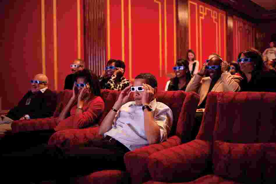 A few weeks after inauguration, President Obama, the First Lady, friends and members of Congress donned 3-D glasses while watching a commercial during Super Bowl XLIII in the family theater of the White House. 
