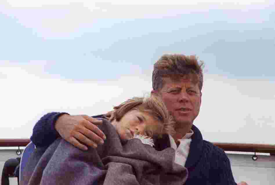 Cecil Stoughton's photographic coverage evolved from typical ceremonial images to fresher, documentary-style pictures like this one of John F. Kennedy and his daughter, Caroline, aboard a yacht in Hyannis Port, Mass., 1963. 