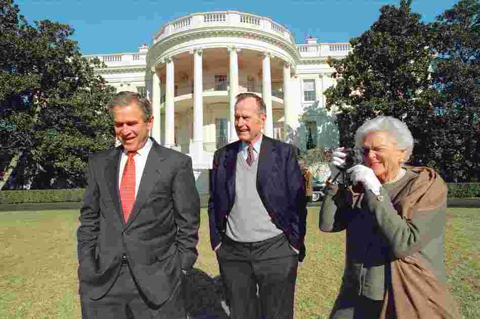 George W. Bush's chief photographer, Eric Draper, caught Barbara Bush photographing George Bush Jr. and Sr. in Jan., 2001. "One thing I learned right off the bat," Draper said, "is that when you say, 'Mr. President,' they both turn around." 