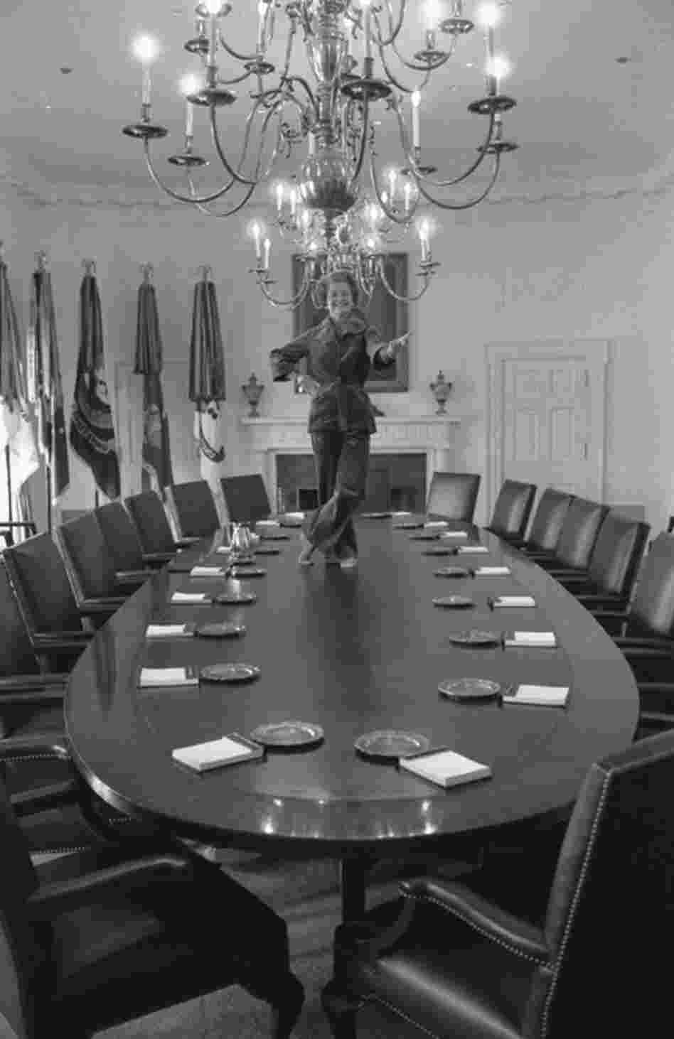 David Hume Kennerly made this picture the day before the Carters moved into the White House. Taking a last tour of the West Wing, Betty Ford told him she'd always wanted to dance on the Cabinet Room table. A former Martha Graham dancer, she slipped off her shoes, hopped on the table and struck a pose. 