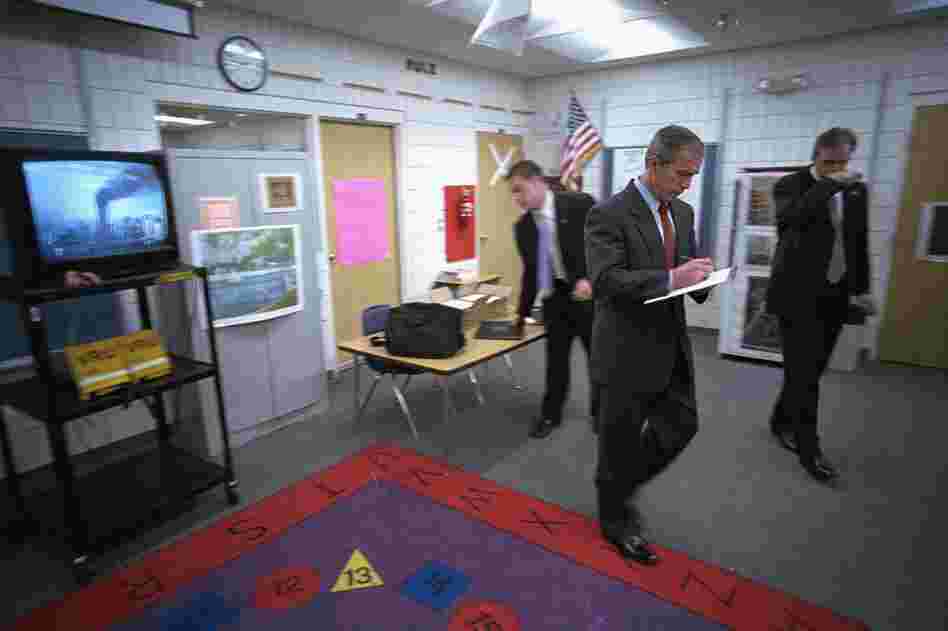 George W. Bush chief photographer Eric Draper's images from 9/11 tell a riveting story. He described it as one of his hardest days as a photographer. Desperate for information that morning, President Bush takes notes while TV news coverage of the burning towers plays in the background. 