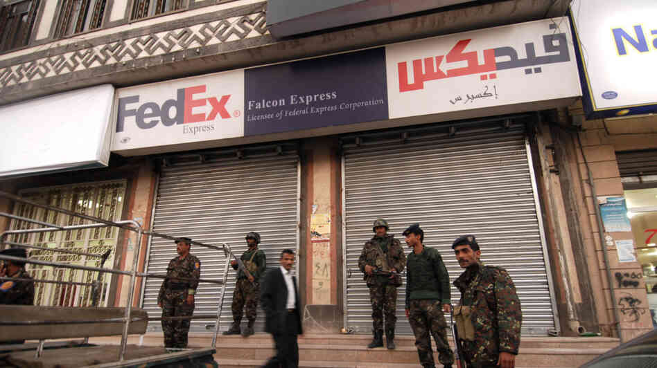 Yemeni security are seen outside a branc Yemeni security are seen outside a branc