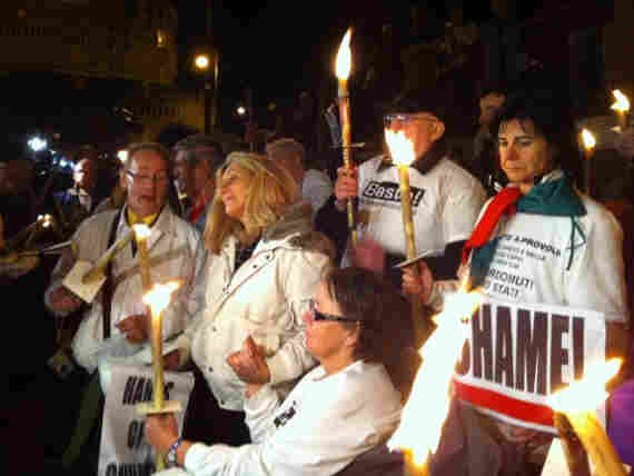 Alleged victims of sexual abuse by Catholic clergy held a candlelight vigil of solidarity. Alleged victims of sexual abuse by Catholic clergy held a candlelight vigil of solidarity.