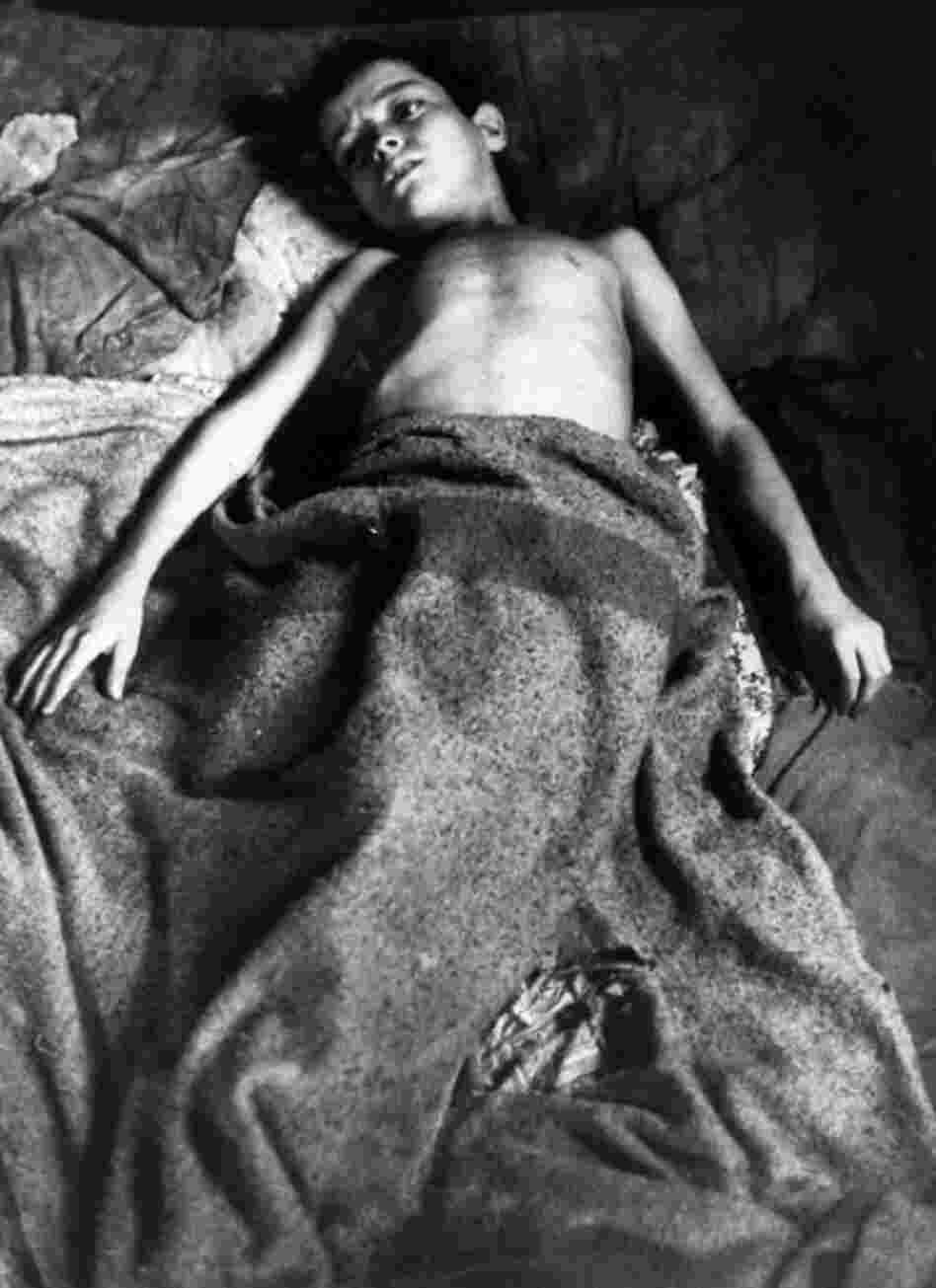 In his story on Flavio, a chronically ill Brazilian boy from Rio's favelas, Gordon Parks personalized the poverty of a continent.  Contributions from Life's readers provided two years of treatment for Flavio at a hospital in Denver, a new home in Rio, and built a drainage system for the whole favela. He survived, and Parks — photographer, filmmaker, musician, author and poet ... would lo...