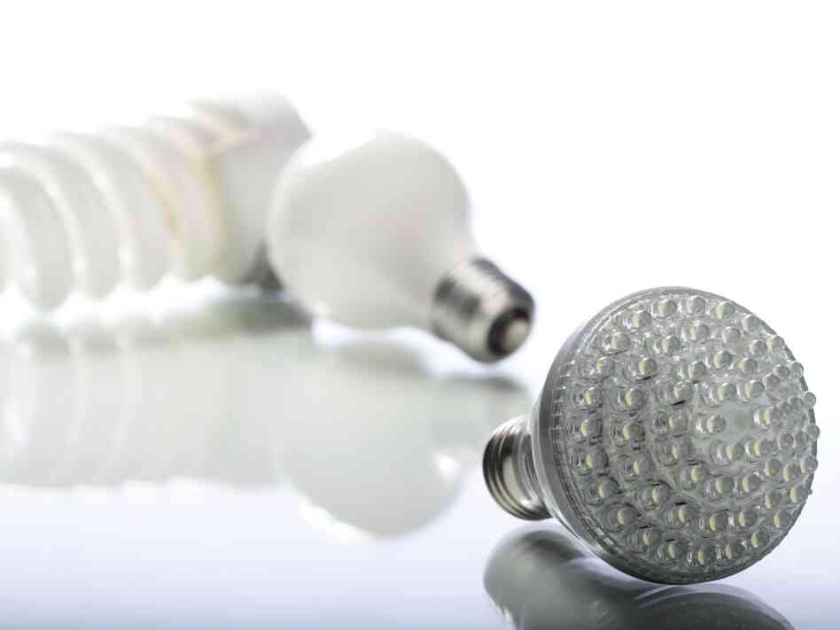 LED bulb compares against an incandescent and compact fluorescent light bulb. LED bulb compares against an incandescent and compact fluorescent light bulb.